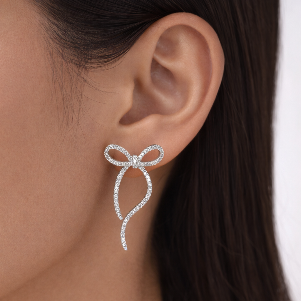 SILVER BOW EARRINGS
